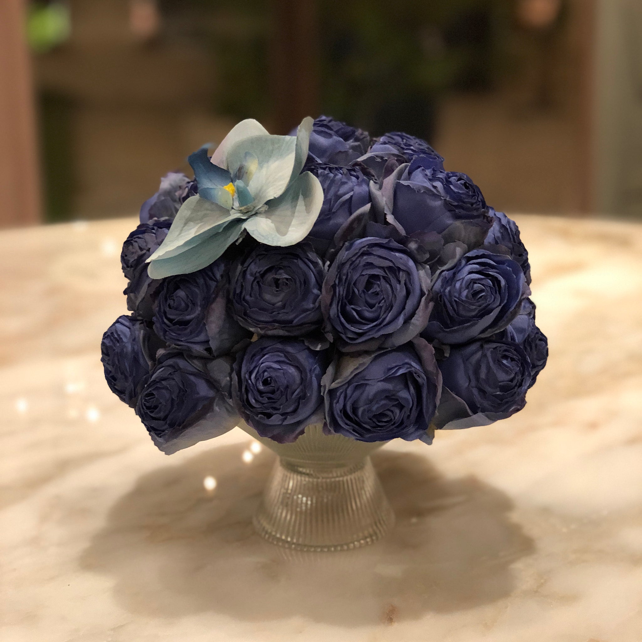 Silk Faux Blue Rose Arrangement with Glass Stand